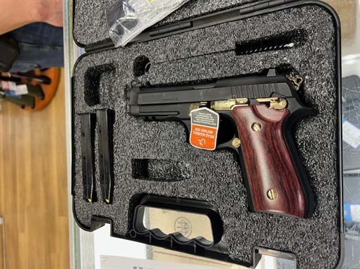 Taurus 1-920151GLD-HW1 92 Full Size Frame 9mm 17+1 5" Matte Black Stainless Steel Barrel, Matte Black Serrated Alloy Steel Slide, Matte Black w/Gold Accents Aluminum Frame w/Picatinny Rail, Wood Grip 1-920151GLD-HW1 1920151GLDHW1